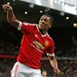 Anthony Martial merayakan gol yang dicetaknya ke gawang Liverpool di Stadion Old Trafford, Inggris. Sabtu (12/9/2015). (Action Images via Reuters/Carl Recine)