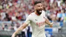 Olivier Giroud yang kini berstatus striker AC Milan juga akan menghadapi Chelsea yang merupakan salah satu mantan klubnya di Liga Inggris. (AFP/Filippo Monteforte)