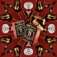 Samba Nights Coffee memancarkan keindahan seni desain dengan kotak merah yang dihiasi pita elegan. Foto: Document/BachaCoffee