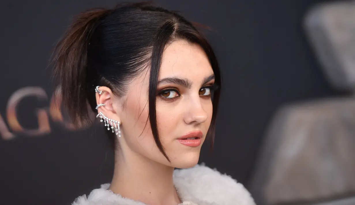 Aktris Inggris Emily Carey menghadiri pemutaran perdana serial drama asli HBO 'House of the Dragon' di Academy Museum of Motion Pictures, Los Angeles, Amerika Serikat, 27 Juli 2022. House of the Dragon akan fokus dalam menceritakan kisah dari House Targaryen. (Chris Delmas/AFP)