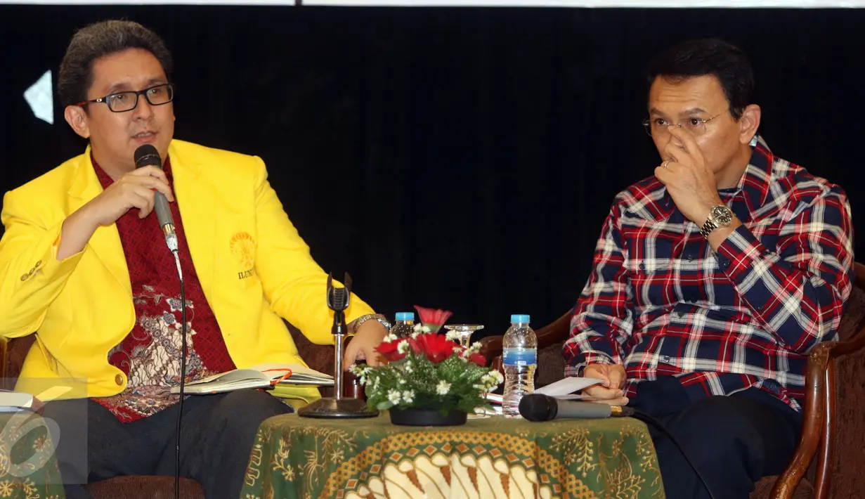 Cagub DKI Jakarta, Basuki Tjahaja Purnama (kanan) saat menghadiri Urun Rembug Iluni UI di Grand Sahid Jaya, Jakarta, Kamis (12/1). Urun rembug berlangsung tertutup. (Liputan6.com/Helmi Fithriansyah)