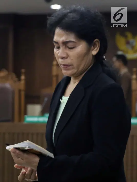 Hakim ad hoc nonaktif Pengadilan Tipikor Medan, Merry Purba usai menjalani sidang pembacaan tuntutan di Pengadilan Tipikor, Jakarta, Kamis (25/4). Sebelumnya, Merry Purba didakwa menerima suap dari pengusaha Tamin Sukardi. (Liputan6.com/Helmi Fithriansyah)