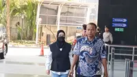 Pakai Masker, Bupati Sukoharjo Bungkam saat Tiba di KPK