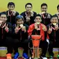 Ekspresi tim putra Indonesia setelah memenangi Kejuaraan Bulutangkis Asia Beregu 2018 di Alor Setar, Malaysia, Minggu (11/2/2018). (PBSI)