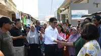 Cagub Sulsel Ichsan Yasin Limpo saat menemui pendukungnya di Jalan Hangtuah, Makassar, Selasa (20/2/2018). (Liputan6.com/Eka Hakim)