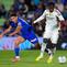 Pemain Getafe, Mario Martin (kiri), dan pemain Real Madrid, Eduardo Camavinga, berebut bola dalam pertandingan La Liga antara Getafe&nbsp;vs Real Madrid, 19 Oktober 2025. (AP Photo/Manu Fernandez)