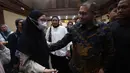 Sebelumnya, Ibrahim Arief atau Ibam terjerat dalam kasus dugaan korupsi pengadaan laptop Chromebook dan Chrome Device Management (CDM) di lingkungan Kemendikbudristek periode 2019–2022, yang diduga merugikan negara senilai Rp 2,18 triliun. Tampak dalam foto, mantan konsultan teknologi Kementerian Pendidikan, Kebudayaan, Riset, dan Teknologi (Kemendikbudristek), Ibrahim Arief atau Ibam (kanan) usai mengikuti sidang pembacaan putusan di Pengadilan Negeri Jakarta Pusat, Selasa (12/5/2026). (Kapanlagi.com/Budy Santoso)