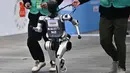 Ajang ini sekaligus menunjukkan tekad China untuk memimpin perlombaan global dalam teknologi mutakhir robot humanoid. (Pedro PARDO/AFP)