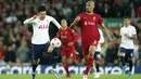 <p>Pemain Tottenham Hotspur Son Heung-min (kiri) menggiring bola melewati pemain Liverpool Fabinho pada pertandingan sepak bola Liga Inggris di Stadion Anfield, Liverpool, Inggris, 7 Mei 2022. Pertandingan berakhir imbang 1-1. (AP Photo/Jon Super)</p>