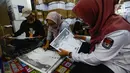 Komisi Pemilihan Umum (KPU) Kota Tangerang Selatan menyiapkan 3.824 alat bantu surat suara khusus tunanetra untuk Pemilu 2024. (merdeka.com/Arie Basuki)