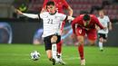 Kai Havertz - Setelah tampil menjadi penentu pertandingan final Liga Champions musim ini, ia dipercaya oleh Timnas Jerman untuk juga merebut piala Euro 2020 (Euro 2021). Piala Eropa kali ini menjadi ajang pertama pemain 21 tahun ini di turnamen resmi internasional. (Foto: AFP/Ina Fassbender)