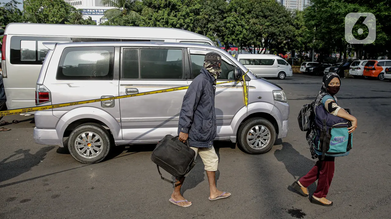 FOTO: Penumpang Travel Gelap Dipulangkan Usai Terjaring Razia