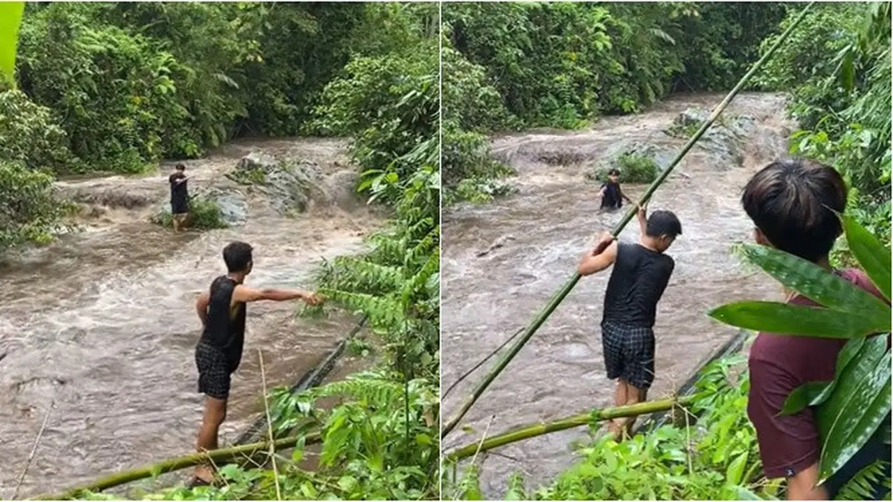 Momen Pemuda Tolong Teman yang Terjebak di Sungai Meluap, Endingnya Bikin Ngakak