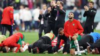 Timnas Maroko diketahui menjadi tim Afrika pertama yang berhasil melaju hingga babak semifinal di Piala Dunia. (AFP/Adrian Dennis)
