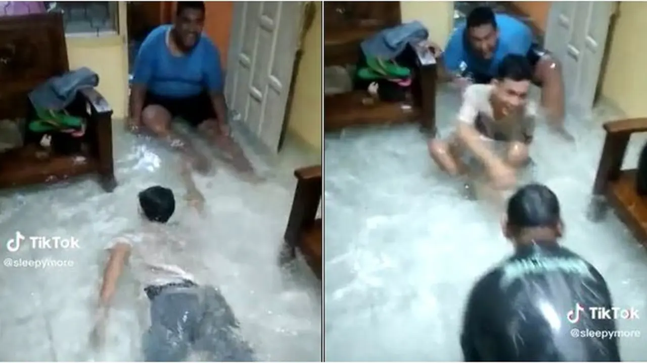 Viral Pemuda Asyik Berenang di Ruang Tamu, Netizen: Air Banjir Jernih Banget