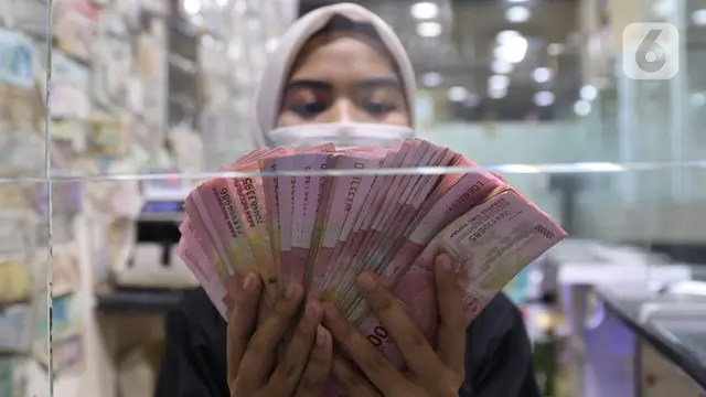 Rupiah Melemah 0,14 Persen