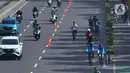 Warga bersepeda di kawasan Bundaran, Hotel Indonesia, Jakarta, Minggu (20/3/2022). Warga mulai ramai beraktifitas olahraga saat Jakarta kembali menerapkan kebijakan PPKM level 2. (Liputan6.com/Herman Zakharia)