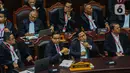 Calon presiden dan calon wakil presiden nomor urut 01, Anies Baswedan dan Muhaimin Iskandar hadir dalam sidang putusan perkara Perselisihan Hasil Pemilihan Umum (PHPU) atau putusan sidang sengketa Pilpres 2024 di Mahkamah Konstitusi (MK), Senin (22/4/2024). (Liputan6.com/Angga Yuniar)