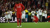 Reaksi para pemain Liverpool setelah gagal meraih gelar juara Liga Europa usai ditaklukkan Sevilla 3-1 pada pertandingan final, di St Jakob-Park, Basel, Rabu atau Kamis (19/5/2016) dini hari WIB. (AFP/Paul Ellis). 