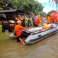 Evakuasi warga jember dari banjir akibat hujan (Dian Kurniawan/Liputan6.com)