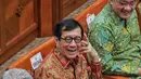 Menteri Hukum dan HAM RI Yasonna Laoly mengikuti Rapat Kerja dengan Komisi III DPR RI di gedung Parlemen, Jakarta, Senin (5/12/2022). Rapat kerja membahas RUU tentang pengesahan perjanjian antara Pemerintah Republik Indonesia dengan Pemerintah Republik Singapura tentang ekstradisi buronan. (Liputan6.com/Angga Yuniar)