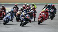 Para pembalap memulai sprint race pada MotoGP Prancis 2025, Sabtu (10/5/2025) malam WIB. (LOIC VENANCE / AFP)