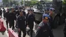 Patroli ini untuk memastikan keamanan dan kenyamanan masyarakat Jakarta pasca terjadinya demonstrasi anarkistis pekan lalu. (AP Photo/Dita Alangkara)