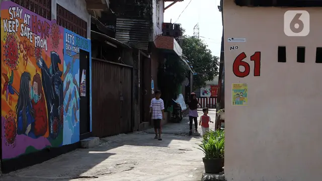 FOTO: Mural Bertema Virus Corona COVID-19 Hiasi Rumah Warga di Depok