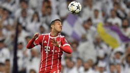 Gelandang Bayern Munchen, Thiago Alcantara menjadi salah satu pemain incaran Manchester United menurut sumber Independent. (AFP/Gabriel Bouys)