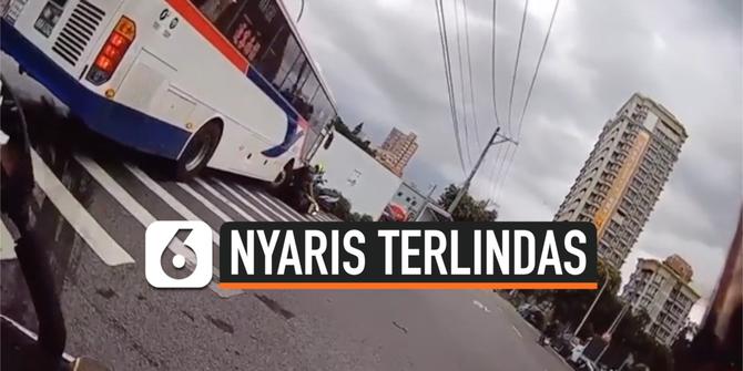 VIDEO: Rekaman Pemotor Nyaris Terlindas Bus yang Berbelok Sembarangan