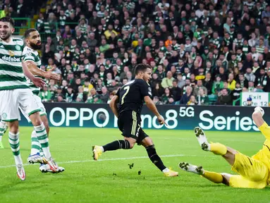 Real Madrid sukses melumat tuan rumah Celtic tiga gol tanpa balas pada laga perdana Grup F Liga Champions yang digelar di Celtic Park, Glasgow, Selasa (6/9/2022). (AFP/Andy Buchanan)