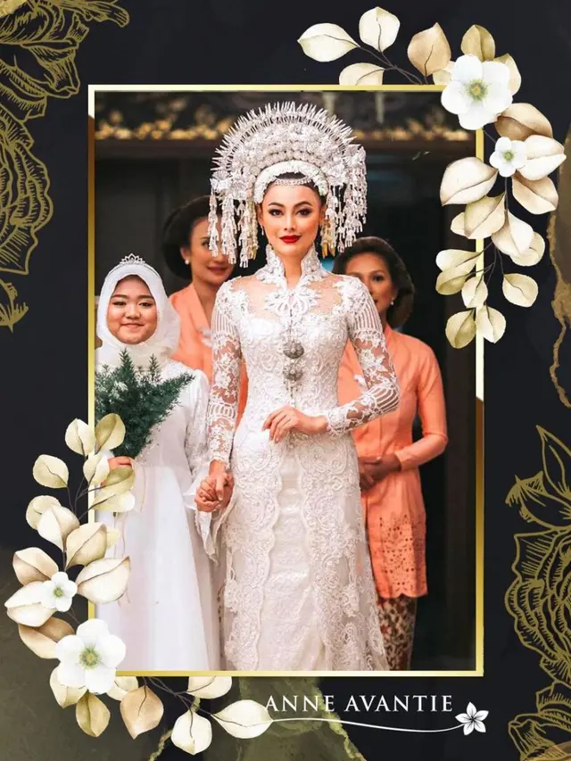 Whulandary Herman kenakan suntiang minang
