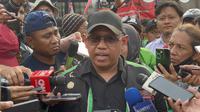 Ketua Umum Garda Indonesia, Raden Igun Wicaksono di depan Gedung DPR, Jakarta. (Foto: Liputan6.com/Ady Anugrahadi).
