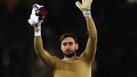 Kiper AC Milan, Gianluigi Donnarumma. (MARCO BERTORELLO / AFP)