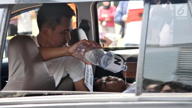 Aulia Kesuma Rekonstruksi Pembakaran Jasad Suami dan Anak Tiri