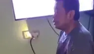 Kepala Kantor Otoritas Bandar Udara Wilayah X Merauke itu dipolisikan gara-gara videonya viral saat menginjak-injak kitab suci Alquran. (Tangkapan layar)