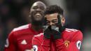 Gelandang Manchester United (MU), Jesse Lingard, melakukan selebrasi usai mencetak gol ke gawang West Bromwich Albion (WBA) pada laga Premier League di Stadion The Hawthorns, Minggu (17/12/2017). MU menang 2-1 atas WBA. (AP/Nick Potts)