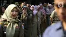 Kegiatan ini rutin dilakukan setiap tahunnya di lingkungan Balai Kota Jakarta saat hari pertama kerja pasca libur Lebaran. (Liputan6.com/Herman Zakharia)