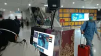 Thermal scanner atau pendeteksi panas tubuh di pintu kedatangan domestik Bandara Pekanbaru. (Liputan6.com/Istimewa/M Syukur)