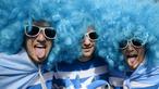 Atribut unik digunakan supporter tim rugby Argentina jelang laga Piala Dunia Rugby melawan Georgia di Kingsholm, Inggris, Jumat (25/9/2015). (Reuters/Dylan Martinez)