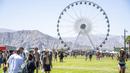 Pengunjung menghadiri Coachella Music and Arts Festival di Empire Polo Club, Indio, California, Amerika Serikat, 15 April 2022. Niki Zefanya dan Rich Brian menjadi musisi Indonesia pertama yang tampil di Coachella. (Photo by Amy Harris/Invision/AP)