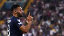 Pemian PSG, Goncalo Ramos melakukan selebrasi setelah mencetak gol penyeimbang 2-2 ke gawang Tottenham Hotspur dalam laga final UEFA Super Cup yang berlangsung di Bluenergy Stadium, Udinese, Italia, Rabu (13/08/2025) waktu setempat. (AFP/Franck Fife)