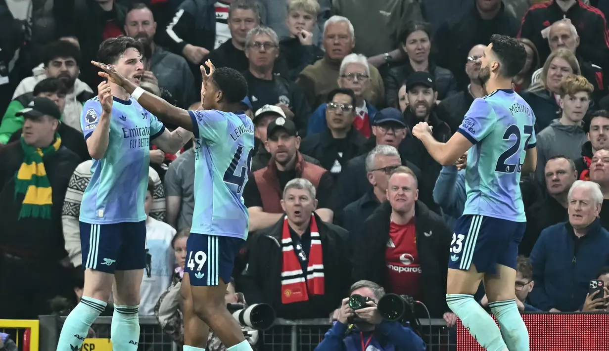 Pada menit ke-74, gelandang Arsenal, Declan Rice mencetak gol penyeimbang. (Paul ELLIS/AFP)