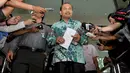 Menteri Andrinof memberikan keterangan pers usai lapor harta kekayaan ke KPK, Jakarta, Kamis (4/12/2014). (Liputan6.com/Miftahul Hayat)