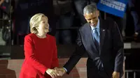 Hillary Clinton dan Barack Obama (AP Photo)