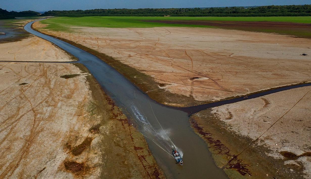 Sejumlah ahli mengungkapkan, kekeringan di Brasil dimulai sejak 2023 lalu ketika adanya El Nino dan fenomena pemanasan suhu air normal di Samudra Pasifik. (MICHAEL DANTAS/AFP)