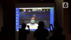 Wali Kota Medan nonaktif, Tengku Dzulmi Eldin mendengarkan Majelis Hakim membacakan vonis dalam sidang melalui video conference di Gedung KPK, Jakarta, Kamis (11/6/2020). Dzulmi Eldin terlibat dalam kasus dugaan menerima suap proyek dan jabatan pada Pemkot Medan tahun 2019. (merdeka.com/Dwi Narwoko)