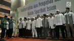 Ketua Umum Lajnah Tanfidziyah Syarikat Islam Hamdan Zoelva membacakan ikrar di hadapan anggota baru saat Silaturahim dan Pengajian Kaum Syarikat Islam di Masjid Istiqlal, Jakarta, Minggu (21/10). (Merdeka.com/Iqbal S Nugroho)