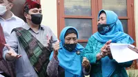 Menteri BUMN Erick Thohir mendapatkan sambutan meriah ketika mengunjungi Kampoeng Lawas Maspati di Kota Surabaya