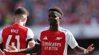 Selebrasi Bukayo Saka saat Arsenal melawan Wolverhampton di Liga Inggris 2024/2025 (AFP)